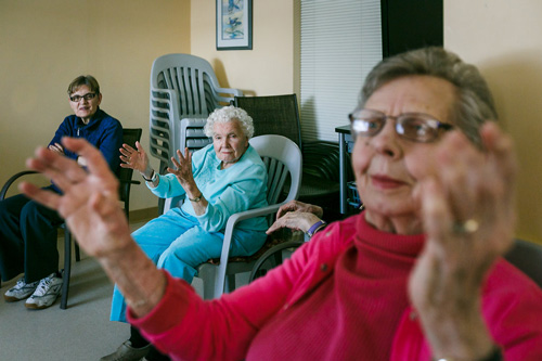 adp-1 Elderly Women Raising Their Hands