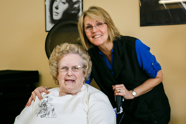 resident-services woman having her hair styled
