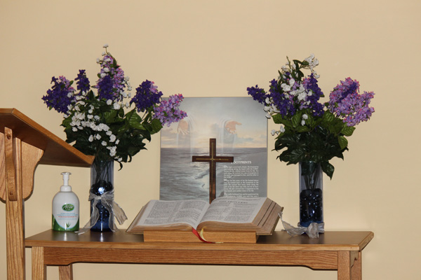 spiritual bible and cross on a table